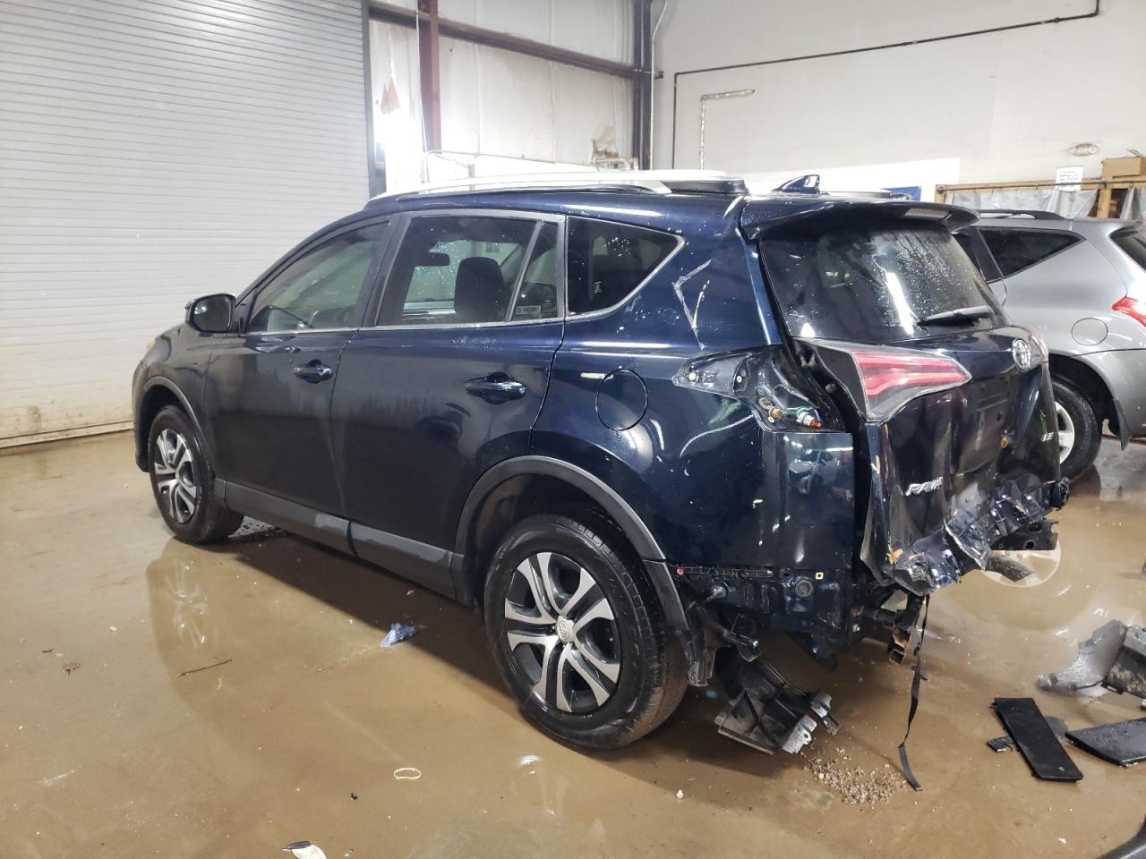 2017 Toyota RAV 4 VIN JTMZFREV4HD101206 Copart auction photo, rear end damage thumbnail 2