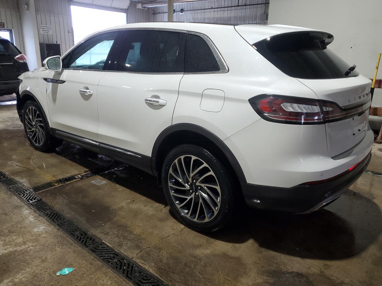 2020 Lincoln Nautilus VIN 2LMPJ8K97LBL28301 Copart auction photo, side / front end damage thumbnail 2