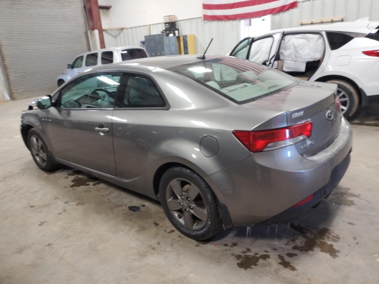 2012 KIA Forte VIN KNAFU6A2XC5504321 Copart auction photo, front end / hail damage thumbnail 2