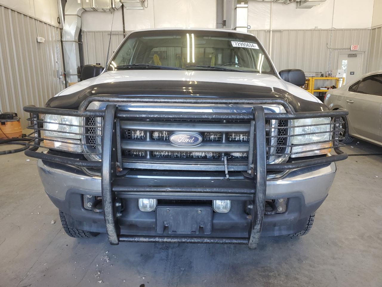 2002 Ford F250 VIN 1FTNX21F02EA71608 Copart auction photo, side damage thumbnail 5