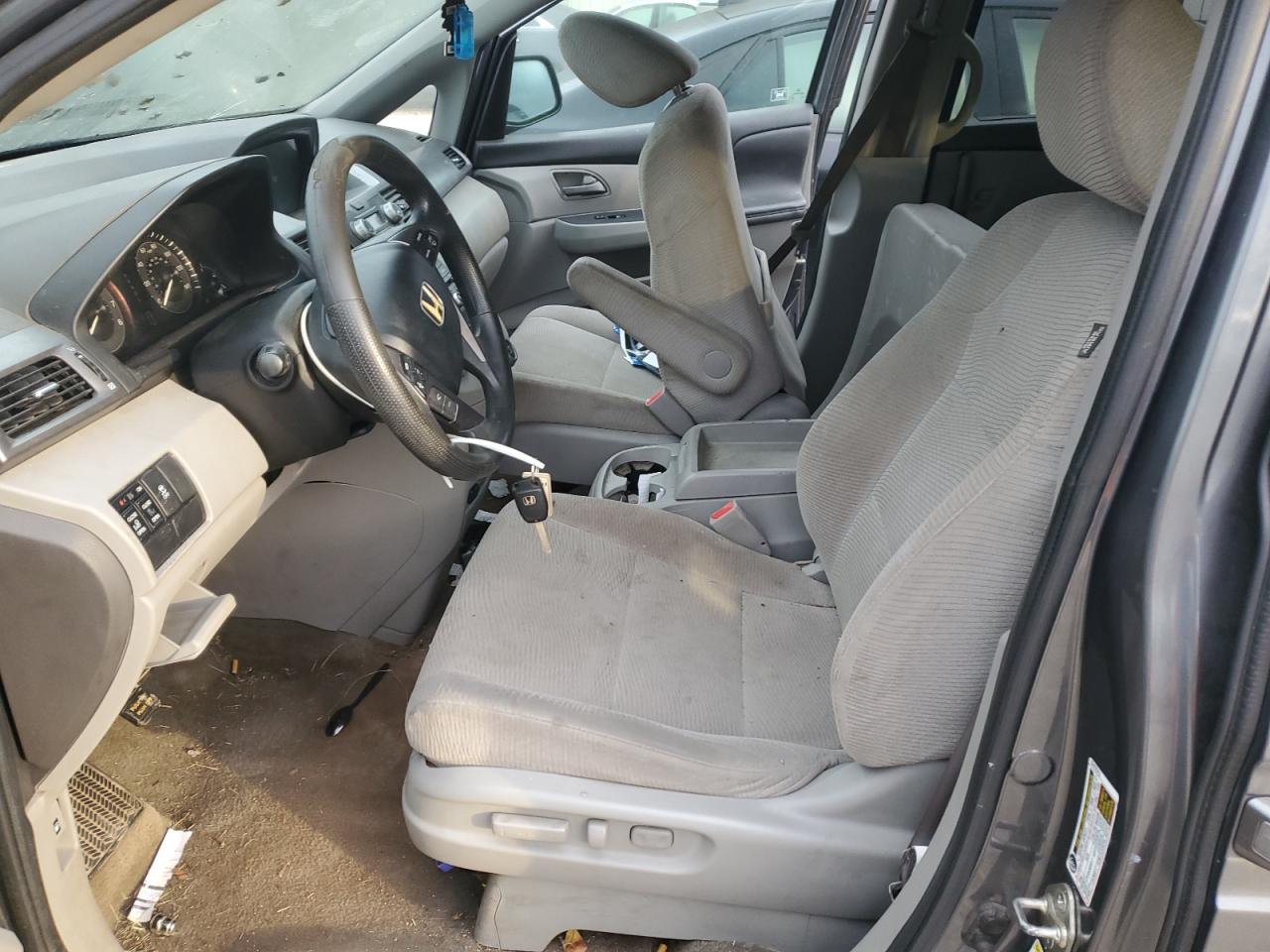 2012 Honda Odyssey VIN 5FNRL5H44CB103849 Copart auction photo, all over damage thumbnail 7