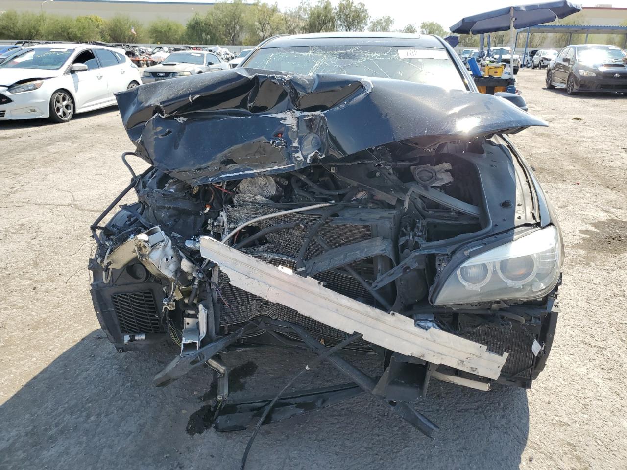2014 BMW 7er VIN WBAYE8C53ED134766 Copart auction photo, front end damage thumbnail 5