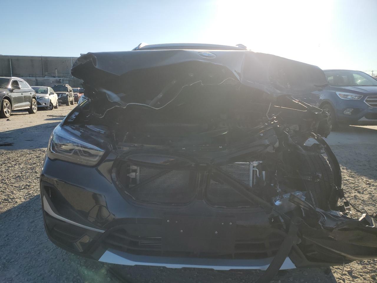 2020 BMW X1 VIN WBXJG9C06L5P79804 Copart auction photo, front end / minor dent/scratches damage thumbnail 5