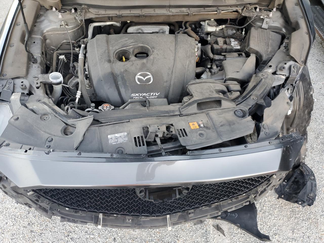 2019 Mazda CX-5 VIN JM3KFADM3K0670288 Copart auction photo, front end / side damage thumbnail 12