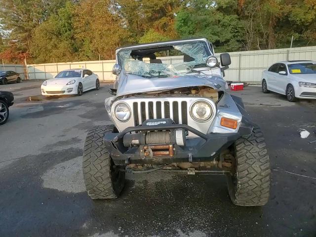 2003 Jeep Wrangler VIN 1J4FA39S93P362329 Copart auction photo, all over / minor dent/scratches damage thumbnail 11