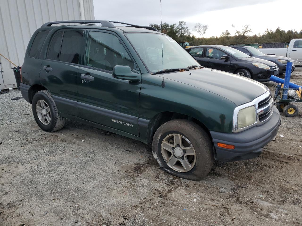 2003 Chevrolet Tracker VIN 2CNBJ13CX36949435 Copart auction photo, front end / mechanical damage thumbnail 4