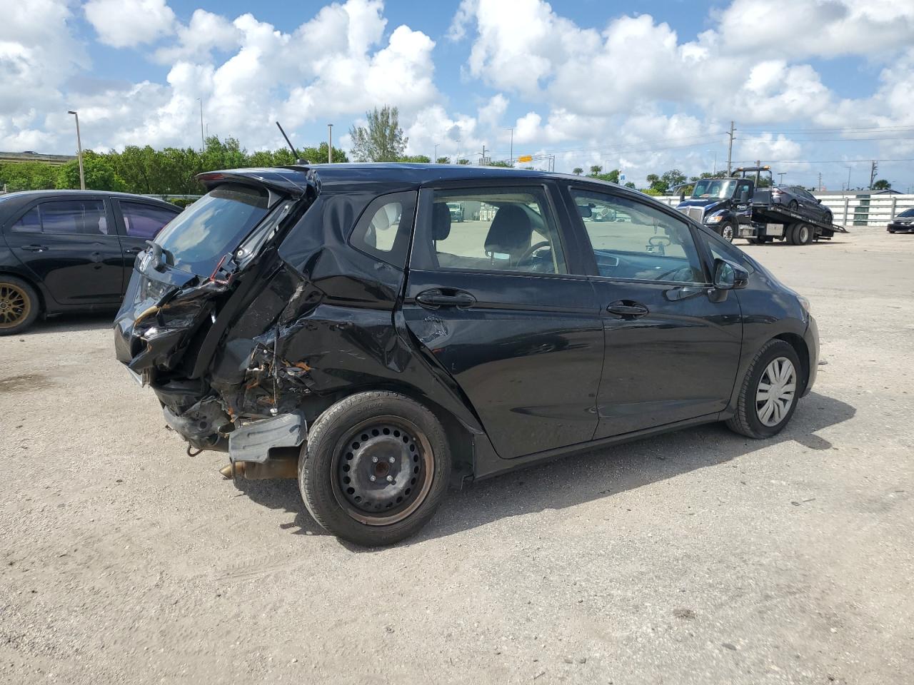 2017 Honda Fit VIN JHMGK5H55HS019003 Copart auction photo, rear end / side damage thumbnail 3