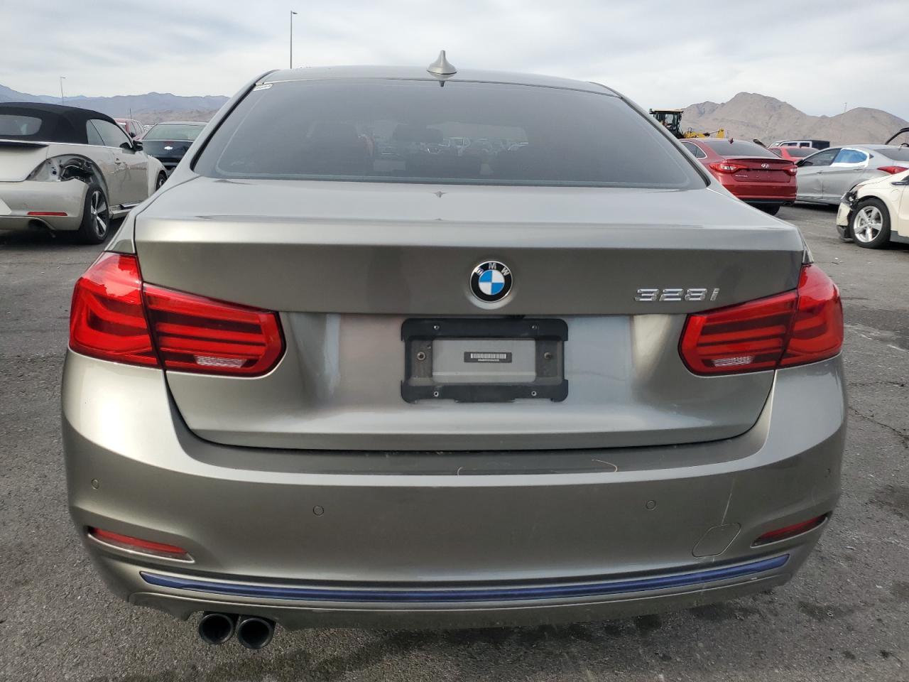 2016 BMW 3er VIN WBA8E9C59GK643636 Copart auction photo, front end damage thumbnail 6
