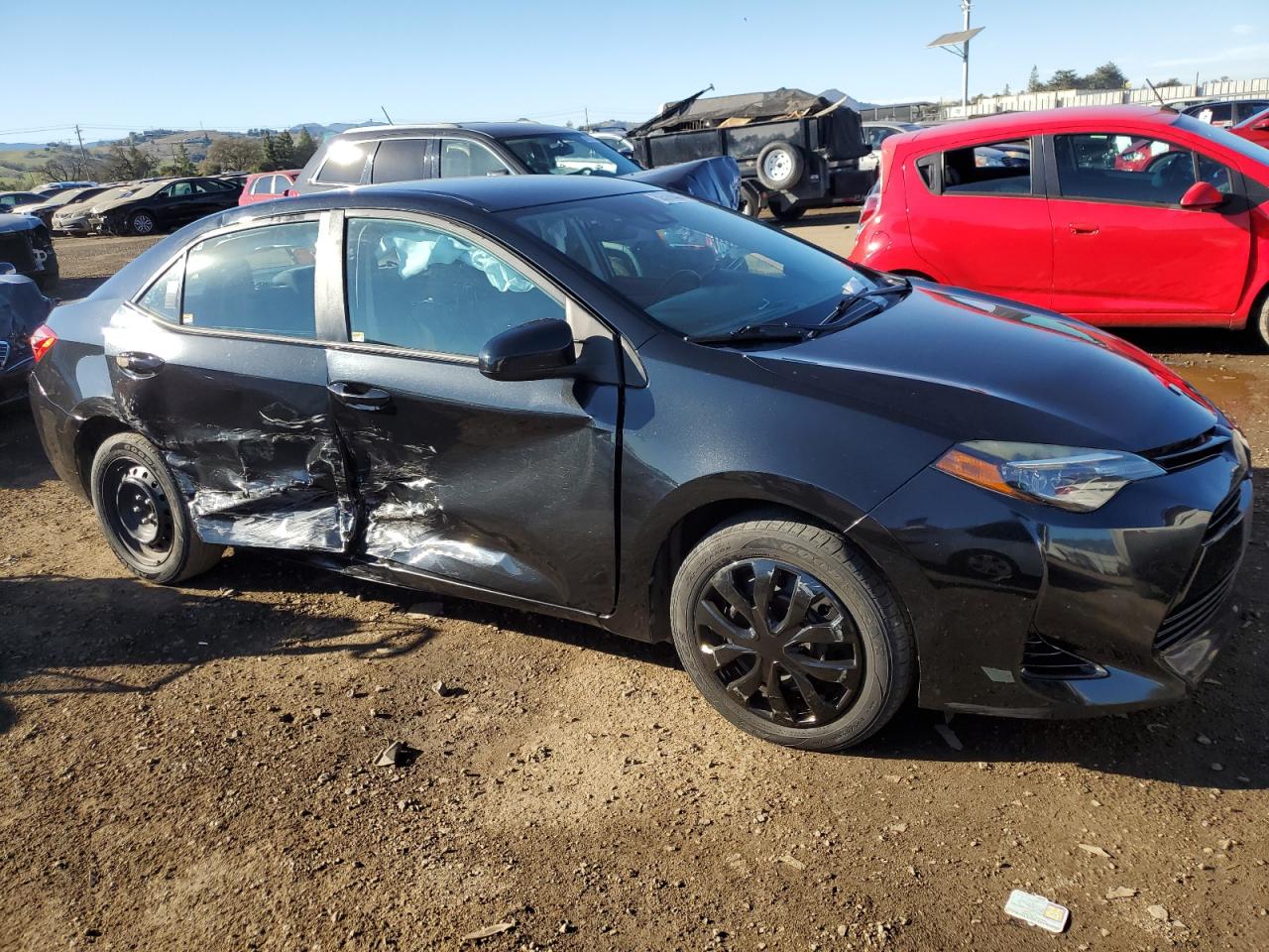 2018 Toyota Corolla VIN 5YFBURHE8JP825986 Copart auction photo, side damage thumbnail 4