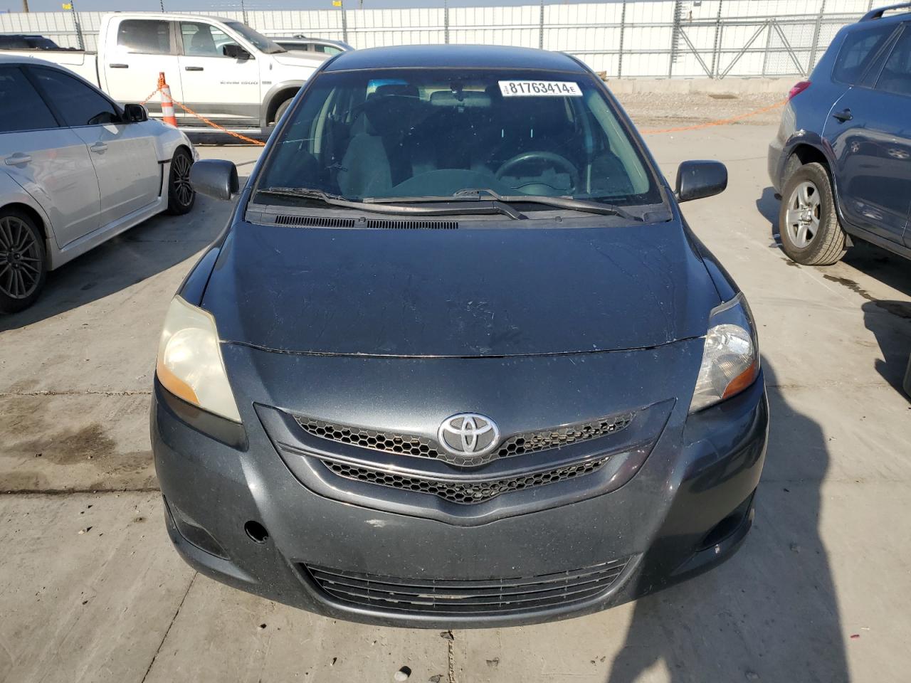 2007 Toyota Yaris VIN JTDBT923071085082 Copart auction photo, side damage thumbnail 5