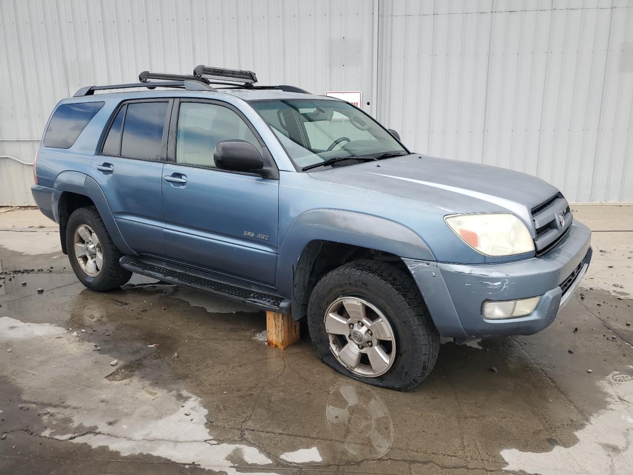 2004 Toyota 4Runner VIN JTEBT14R140030057 Copart auction photo, side damage thumbnail 4