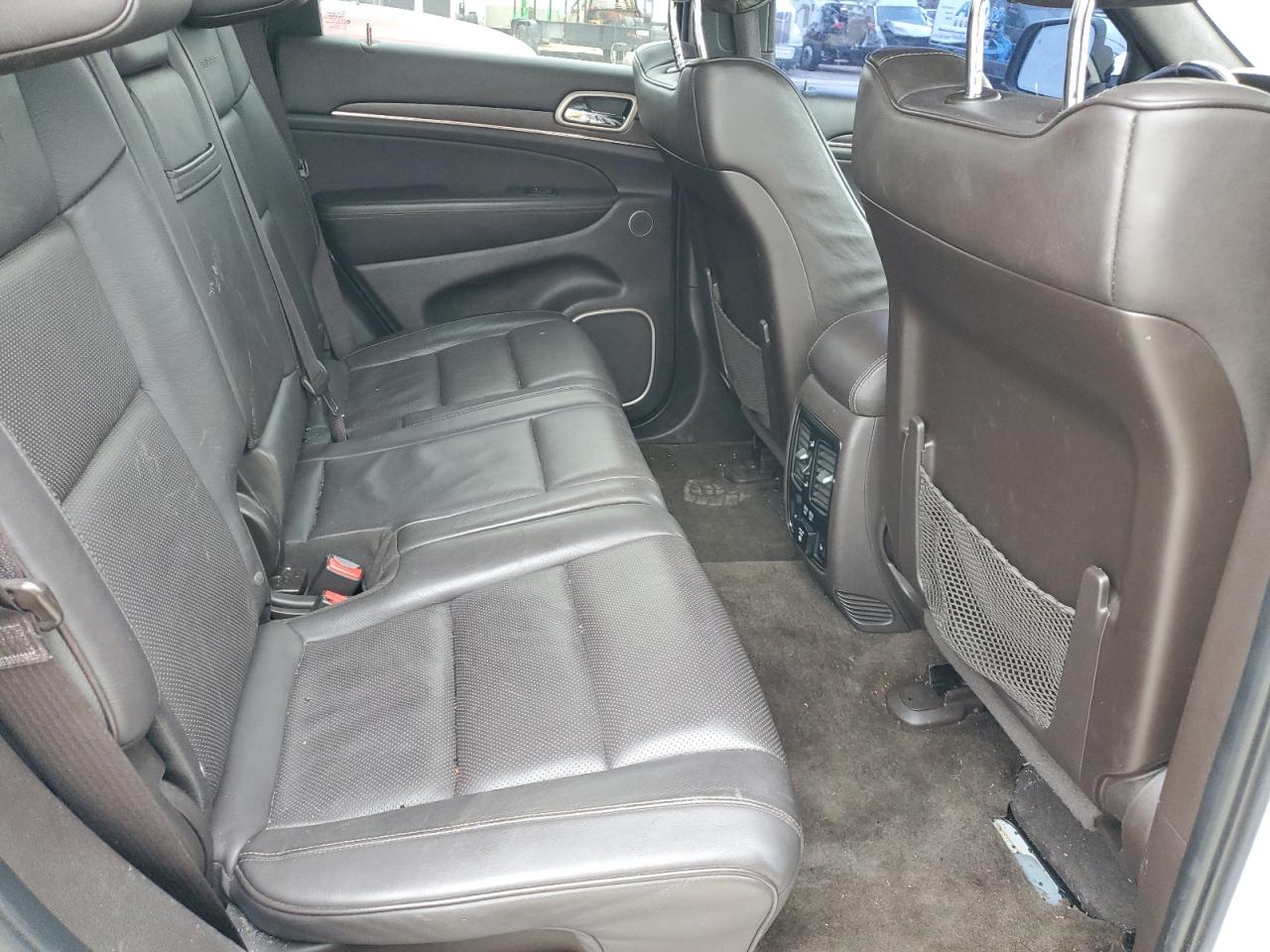 2015 Jeep Grand Cherokee VIN 1C4RJFJTXFC708893 Copart auction photo, vandalism / side damage thumbnail 12