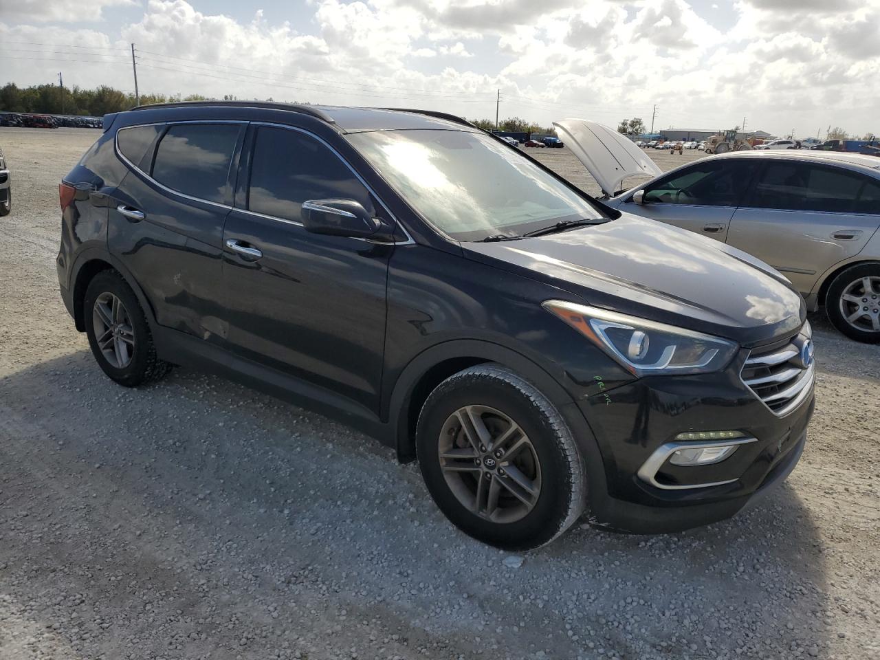 2018 Hyundai Santa Fe VIN 5XYZU3LBXJG553874 Copart auction photo, side / undercarriage damage thumbnail 4