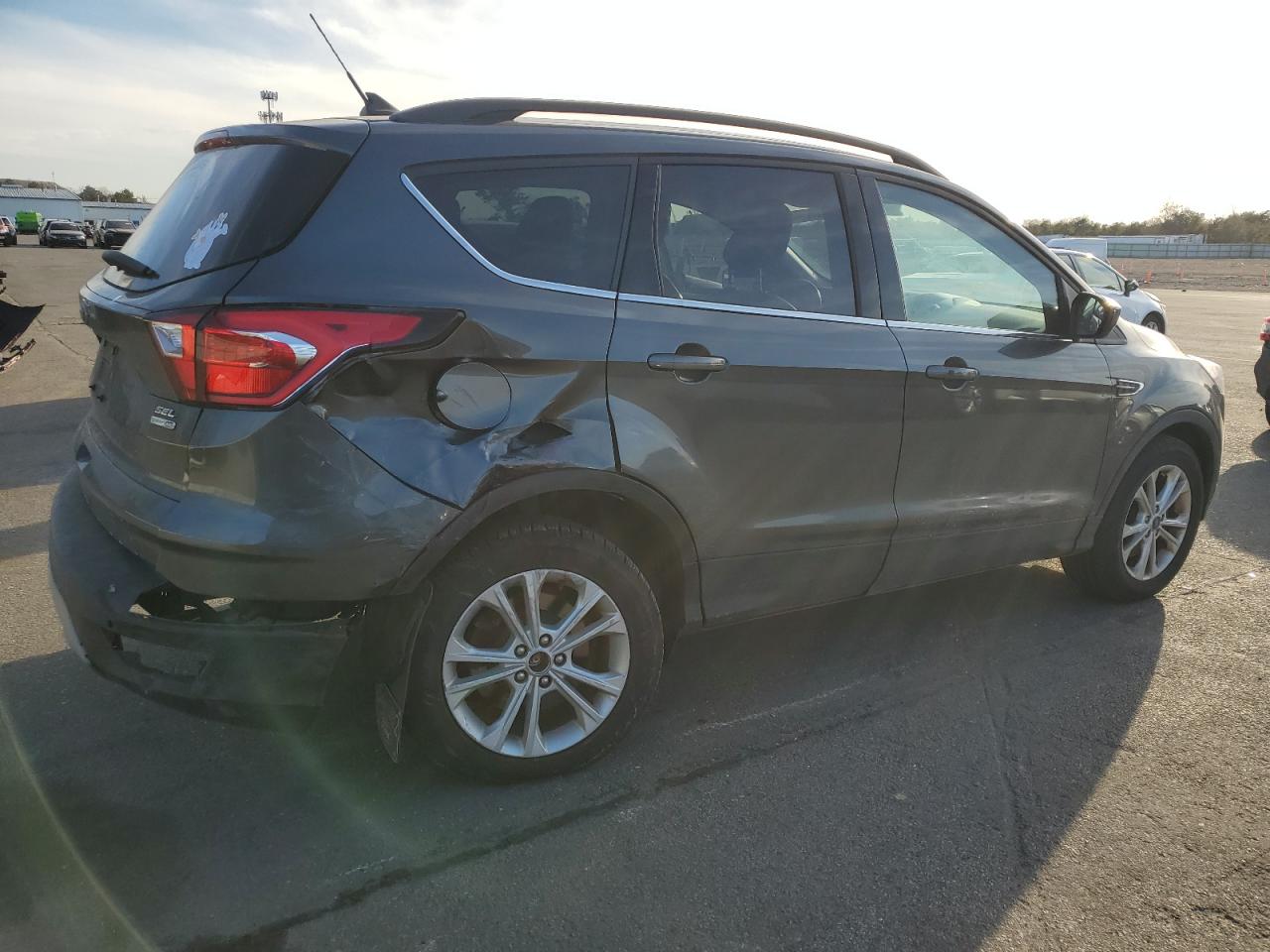 2019 Ford Escape VIN 1FMCU9HD4KUB42386 Copart auction photo, rear end / minor dent/scratches damage thumbnail 3