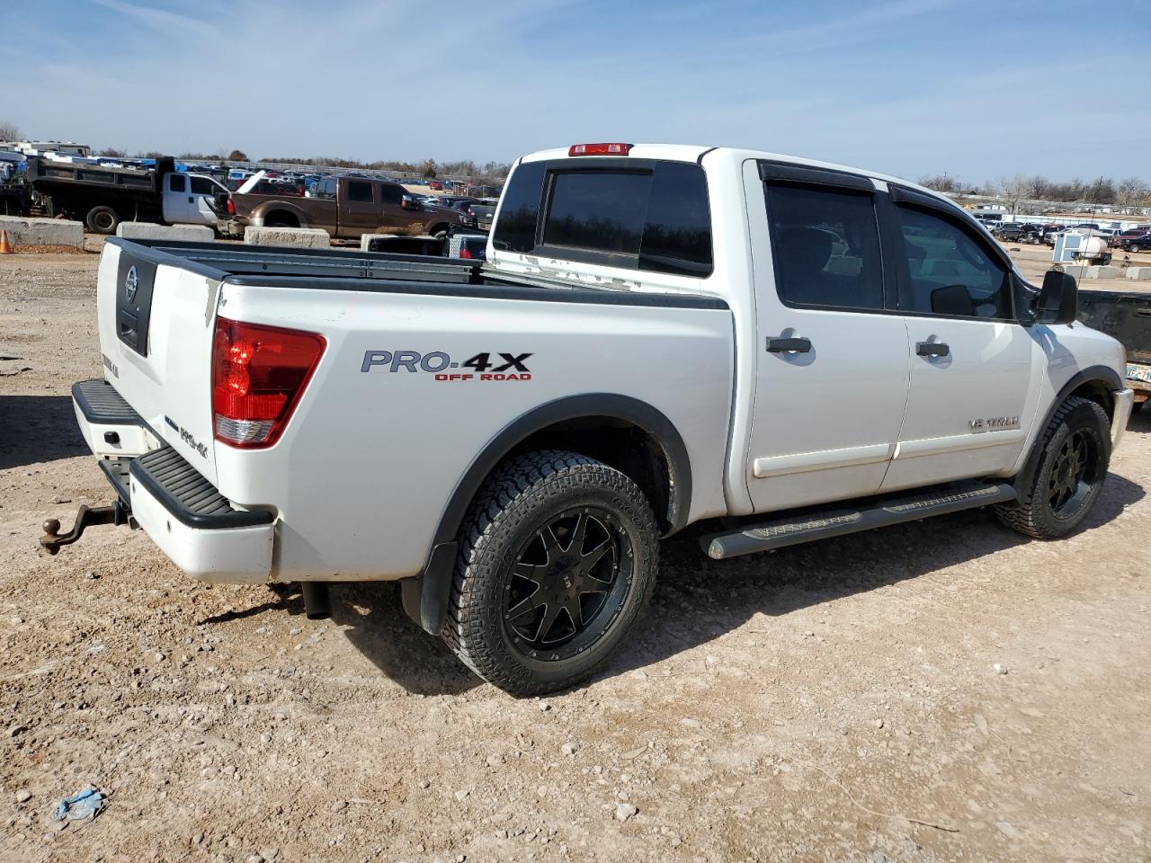 2011 Nissan Titan VIN 1N6BA0EC8BN321974 Copart auction photo, front end / minor dent/scratches damage thumbnail 3