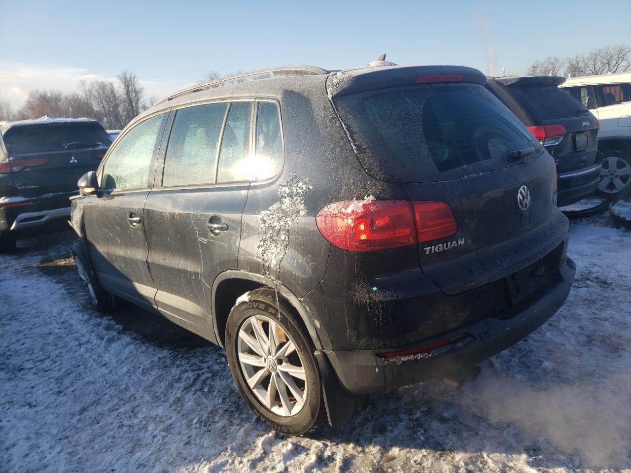 2015 Volkswagen Tiguan VIN WVGBV7AXXFW581510 Copart auction photo, front end / side damage thumbnail 2