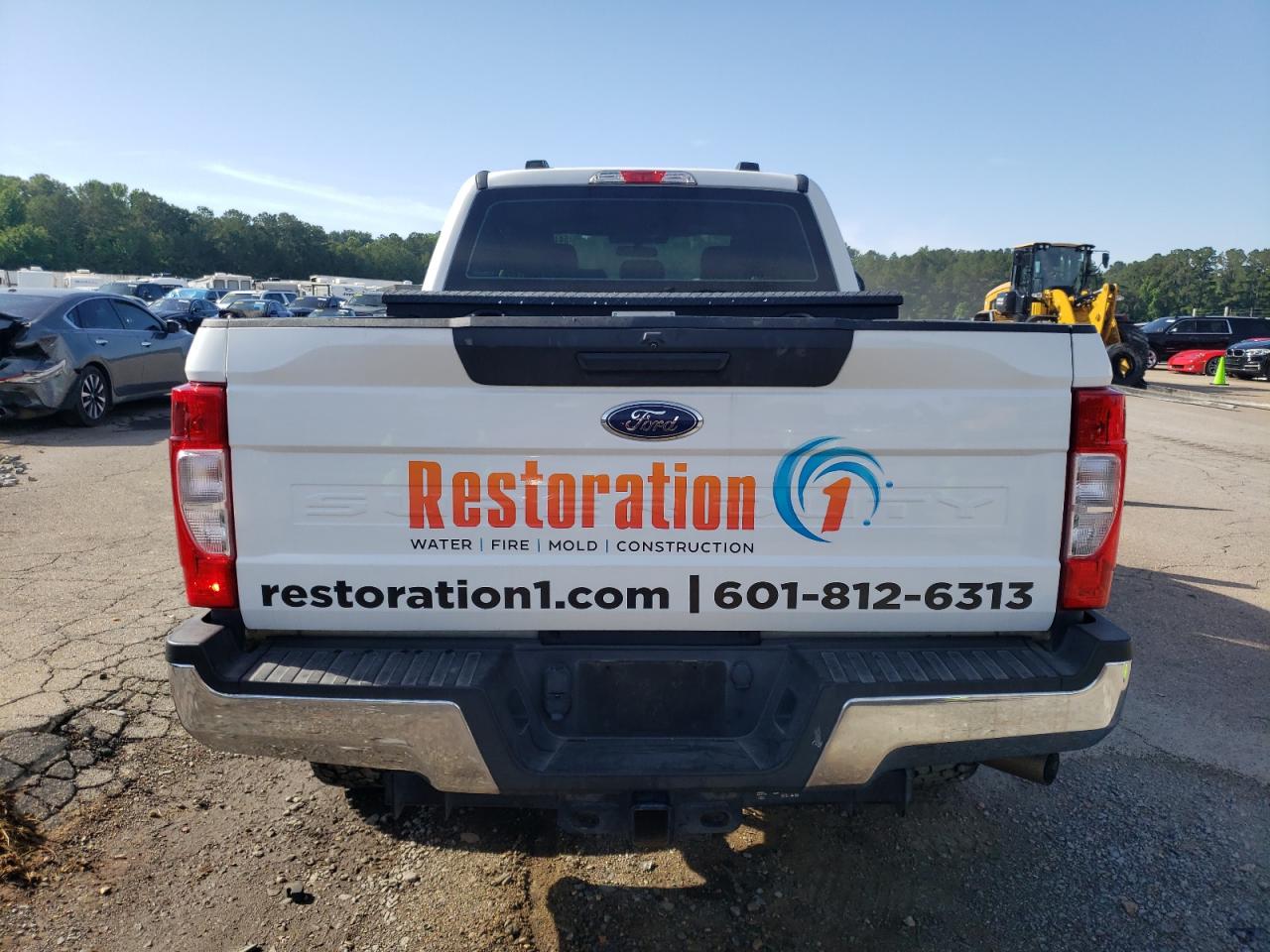 2021 Ford F250 VIN 1FT7W2B69MED95699 Copart auction photo, front end / side damage thumbnail 6