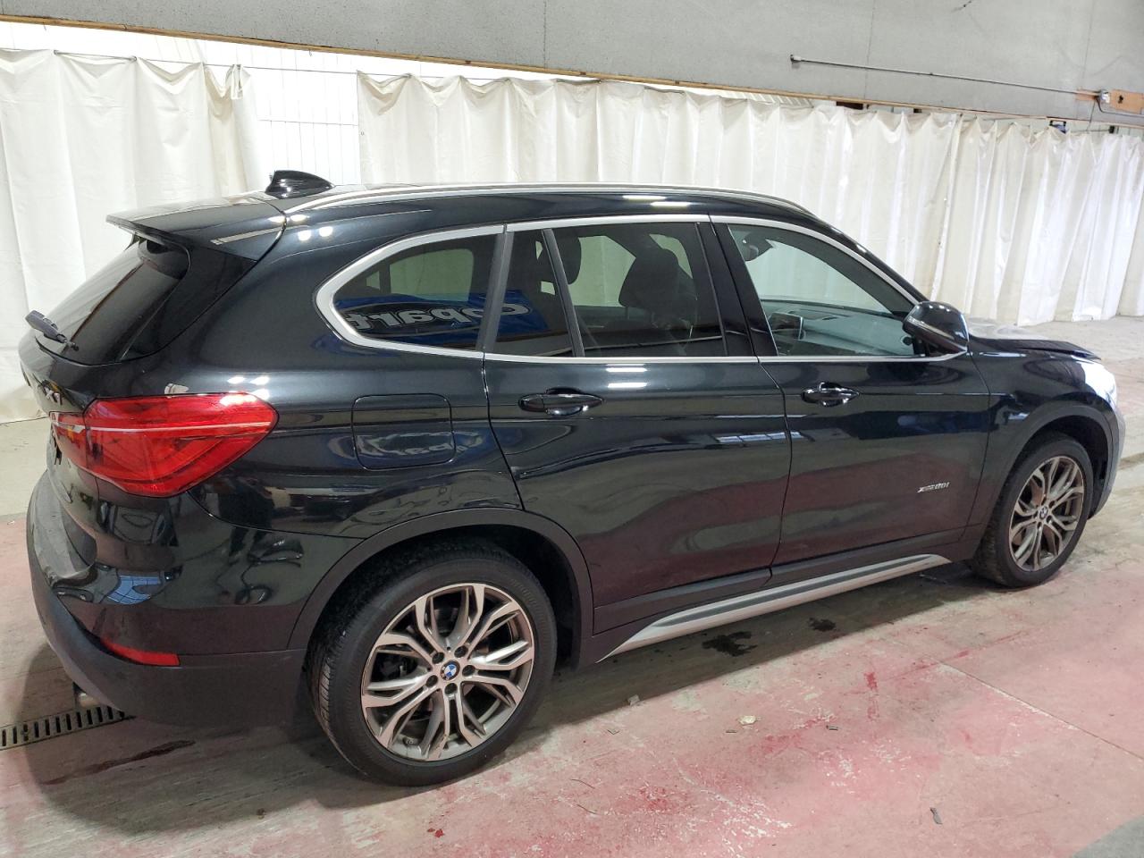 2017 BMW X1 VIN WBXHT3Z35H4A55644 Copart auction photo, front end damage thumbnail 3