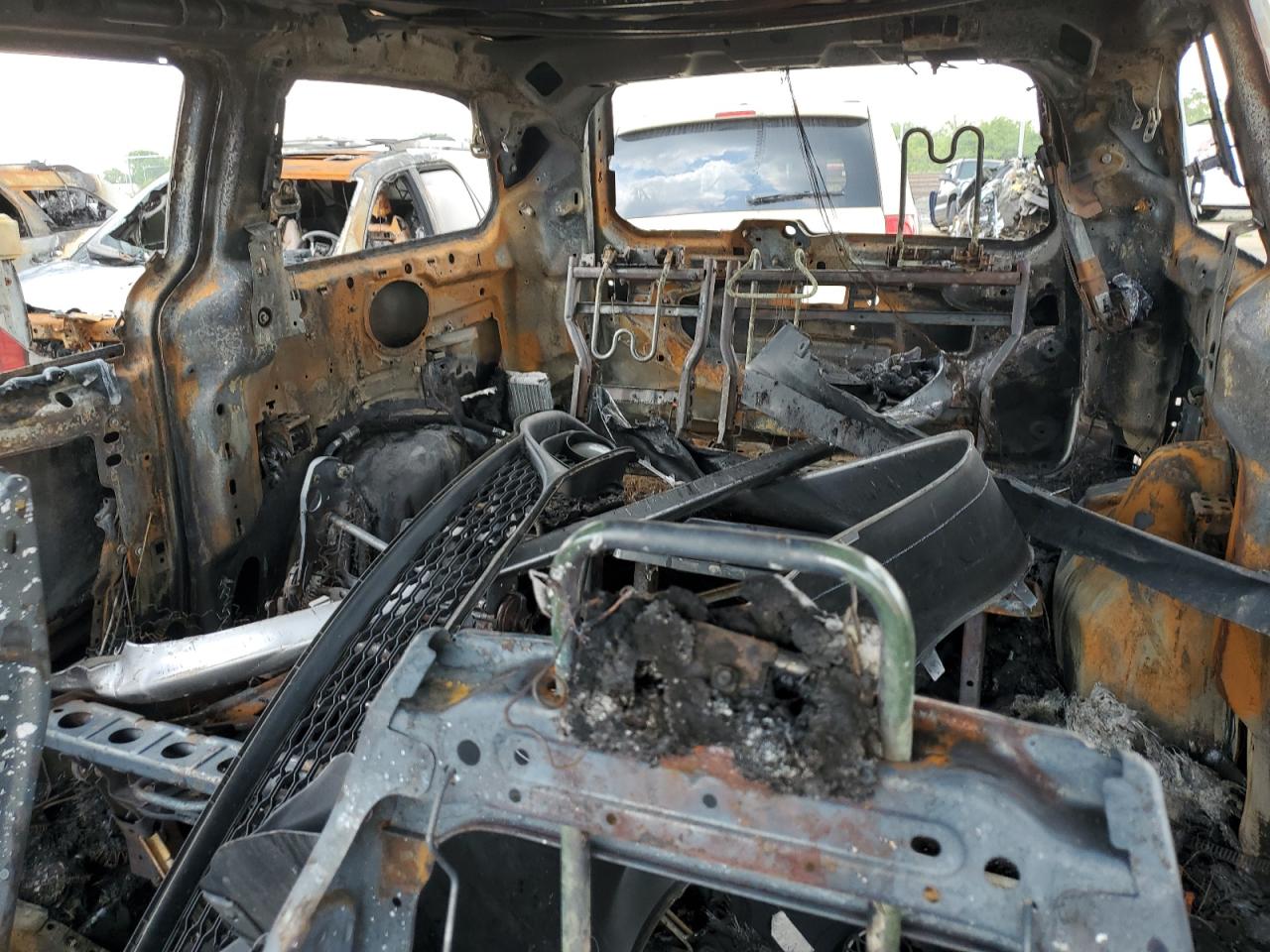 2019 Dodge Caravan VIN 2C4RDGCG7KR621256 Copart auction photo, burn damage thumbnail 10