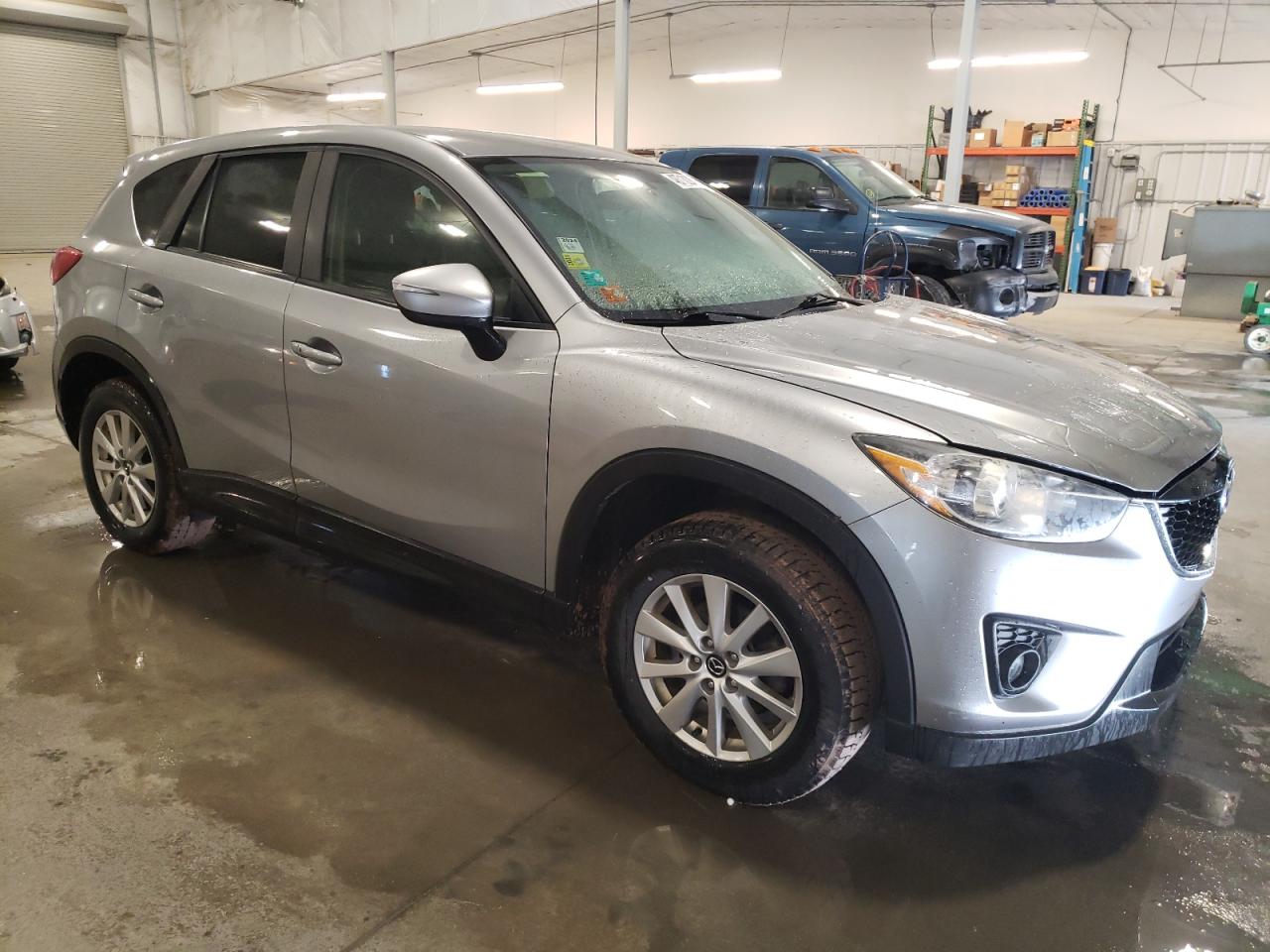 2015 Mazda CX-5 VIN JM3KE4CY7F0516102 Copart auction photo, front end / side damage thumbnail 4