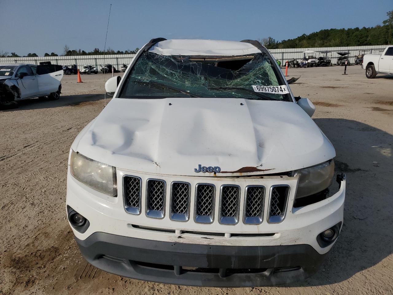 2014 Jeep Compass VIN 1C4NJCEA1ED618336 Copart auction photo, rollover damage thumbnail 5