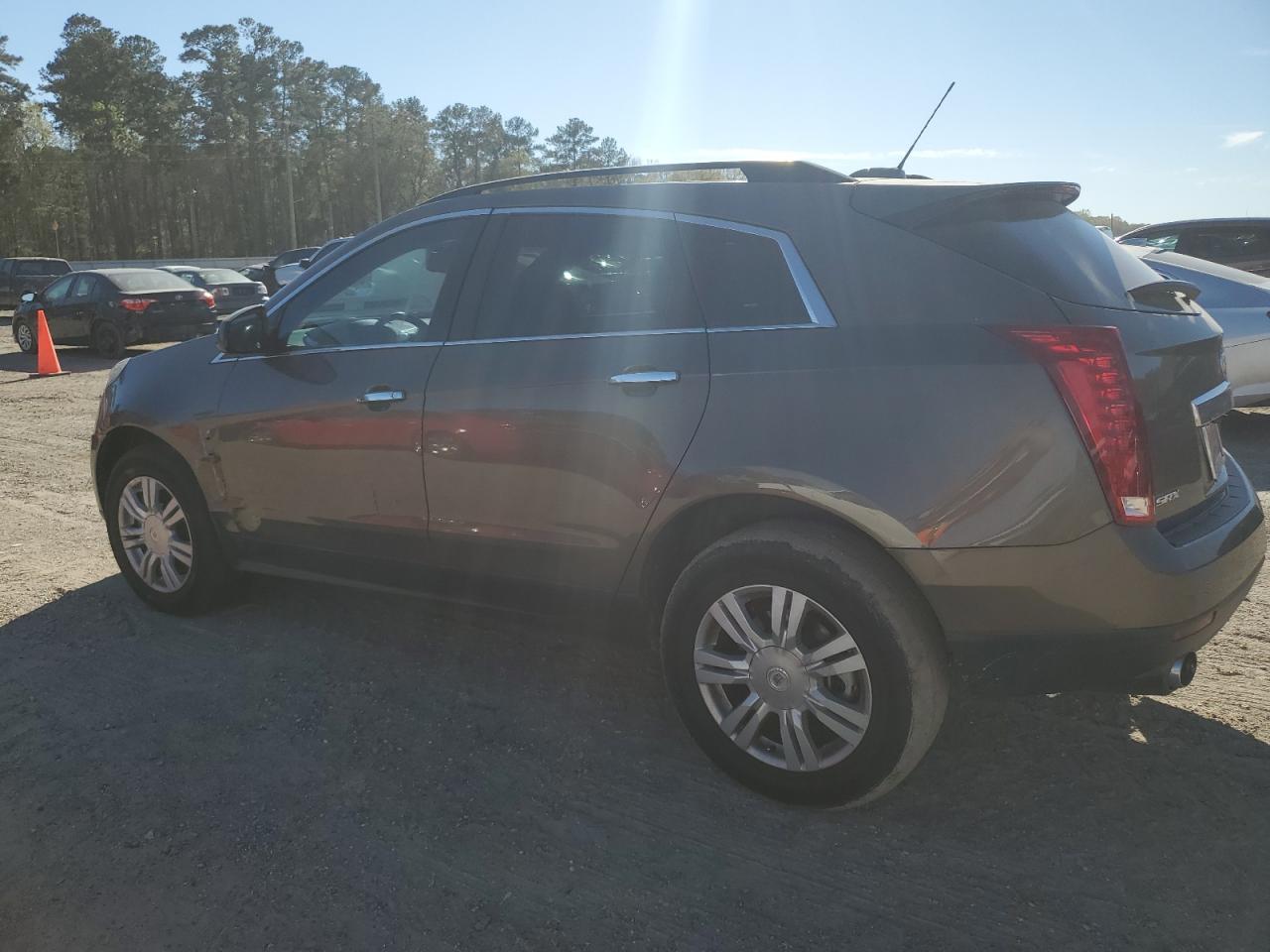 2015 Cadillac SRX VIN 3GYFNAE37FS608842 Copart auction photo, side / front end damage thumbnail 2