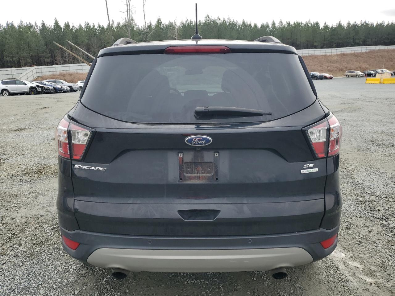 2018 Ford Escape VIN 1FMCU0GD1JUA75984 Copart auction photo, front end / side damage thumbnail 6