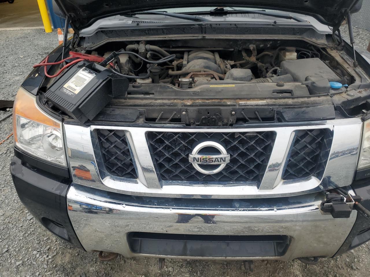 2011 Nissan Titan VIN 1N6AA0CC2BN324013 Copart auction photo, undercarriage damage thumbnail 11
