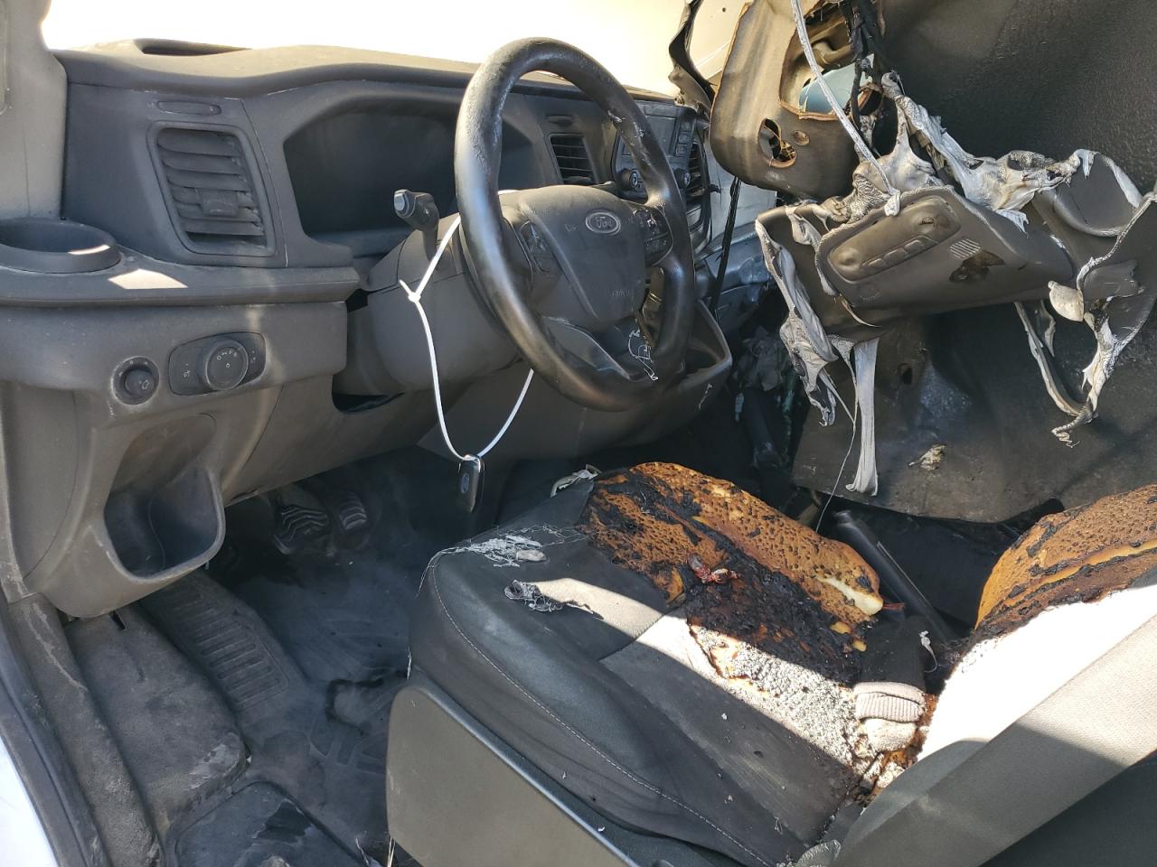 2020 Ford Transit VIN 1FTBR2C84LKA25357 Copart auction photo, vandalism / burn - interior damage thumbnail 8