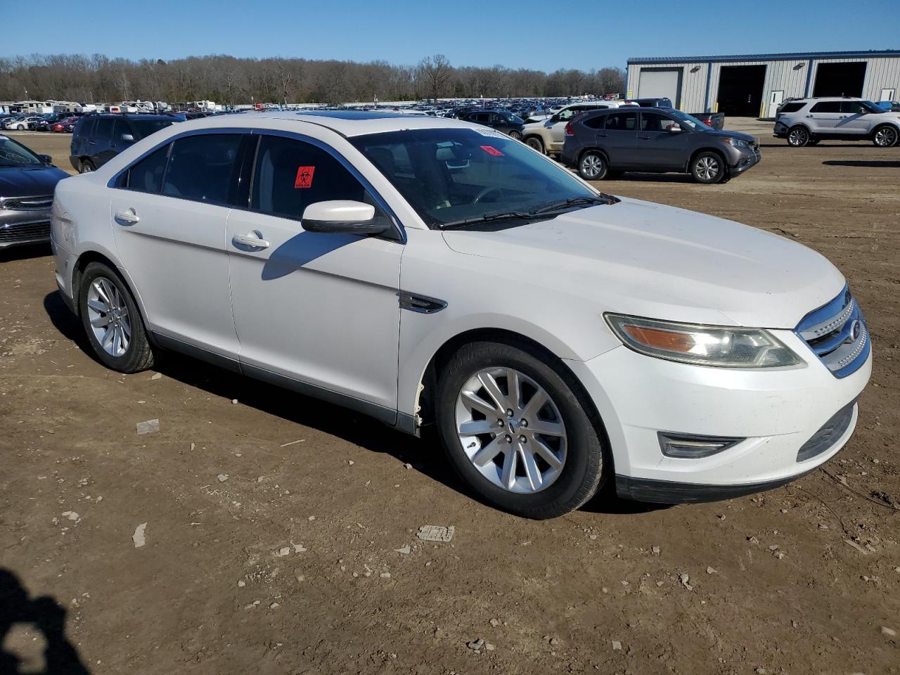 2011 Ford Taurus VIN 1FAHP2EW0BG113857 Copart auction photo, side / rear end damage thumbnail 4