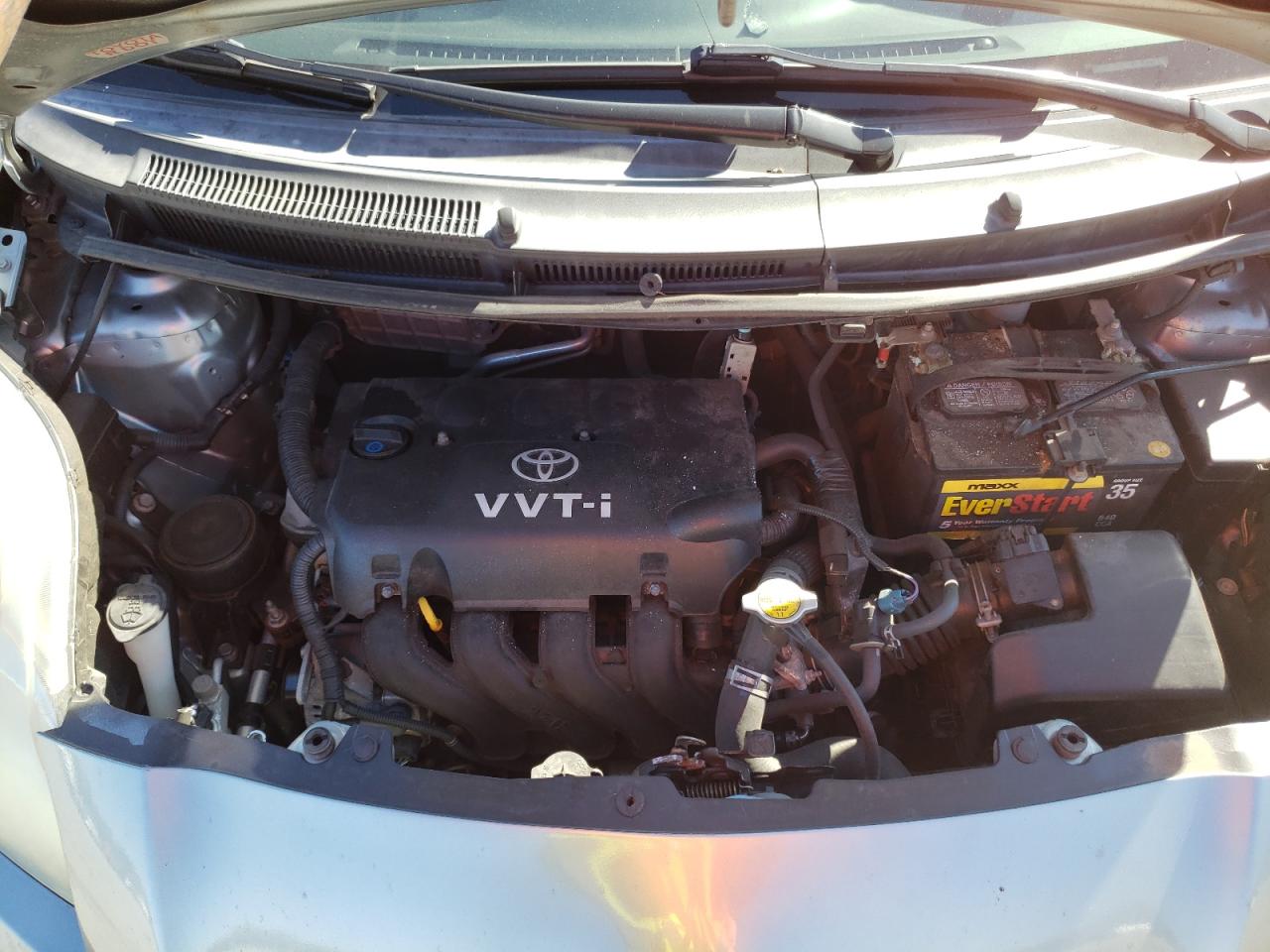 2011 Toyota Yaris VIN JTDKT4K32B5342621 Copart auction photo, side / front end damage thumbnail 13