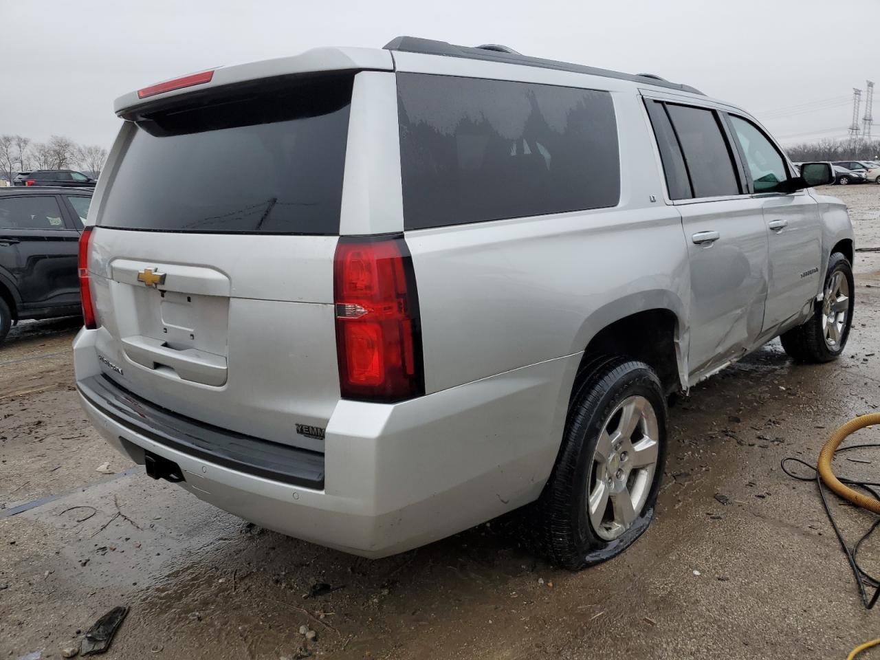 2015 Chevrolet Suburban VIN 1GNSKJKC6FR159584 Copart auction photo, side / minor dent/scratches damage thumbnail 3