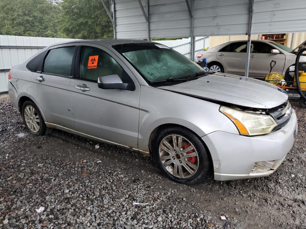 2010 Ford Focus VIN 1FAHP3HN9AW204705 Copart auction photo, water/flood damage thumbnail 4
