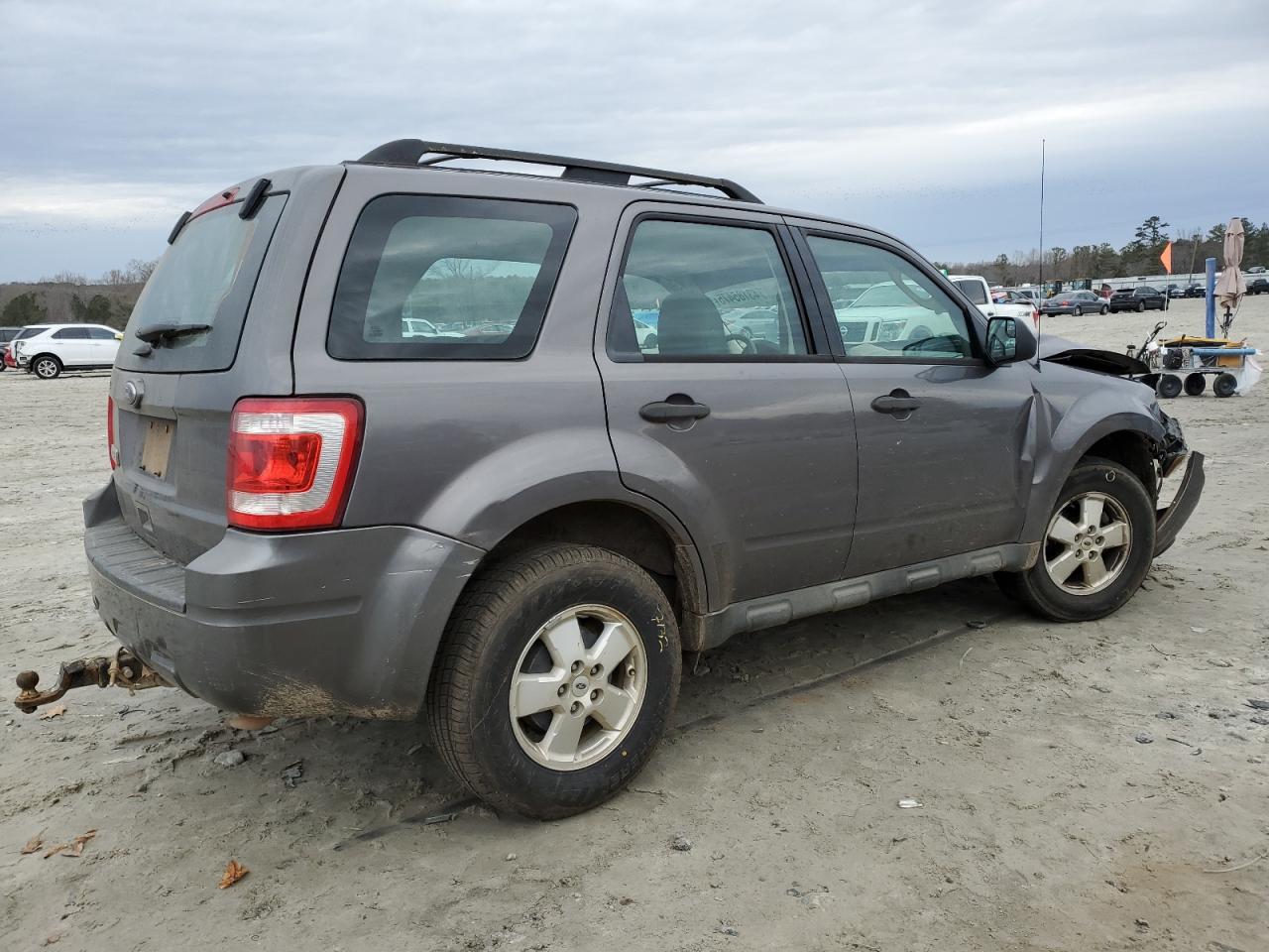 2011 Ford Escape VIN 1FMCU0C78BKC50874 Copart auction photo, front end / side damage thumbnail 3