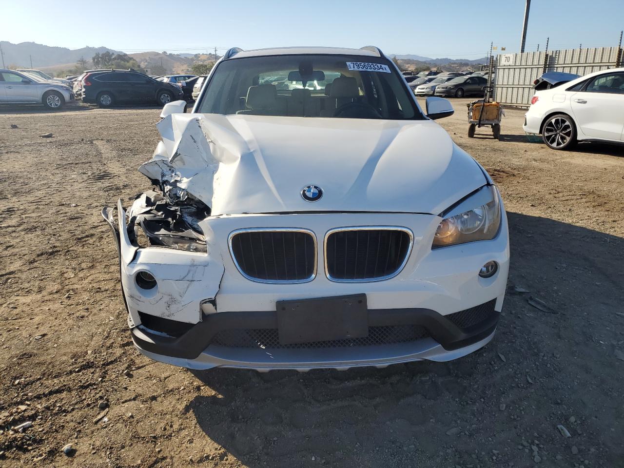 2015 BMW X1 VIN WBAVM1C55FVZ94063 Copart auction photo, front end damage thumbnail 5