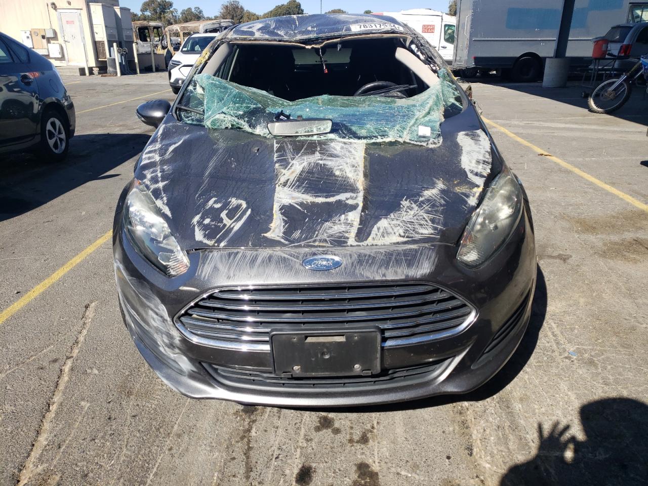2016 Ford Fiesta VIN 3FADP4EJ0GM167610 Copart auction photo, all over damage thumbnail 5