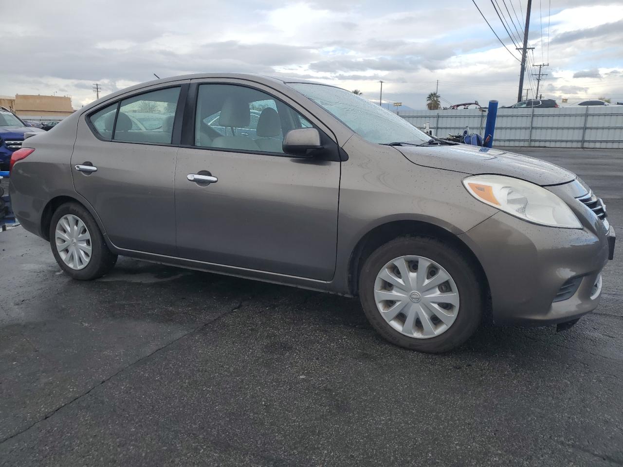 2014 Nissan Versa VIN 3N1CN7AP0EK437597 Copart auction photo, minor dent/scratches damage thumbnail 4