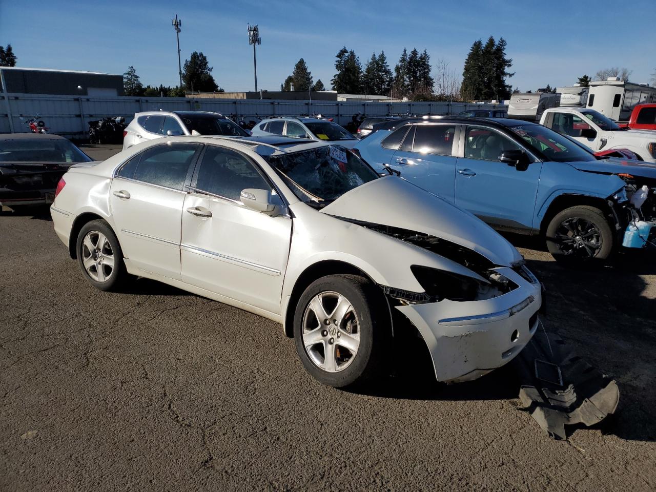 2005 Acura RL VIN JH4KB16575C011433 Copart auction photo, front end / side damage thumbnail 4