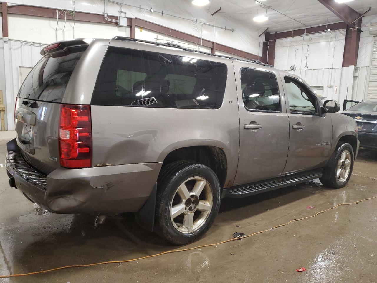 2011 Chevrolet Suburban VIN 1GNSKJE32BR211217 Copart auction photo, burn - interior damage thumbnail 3
