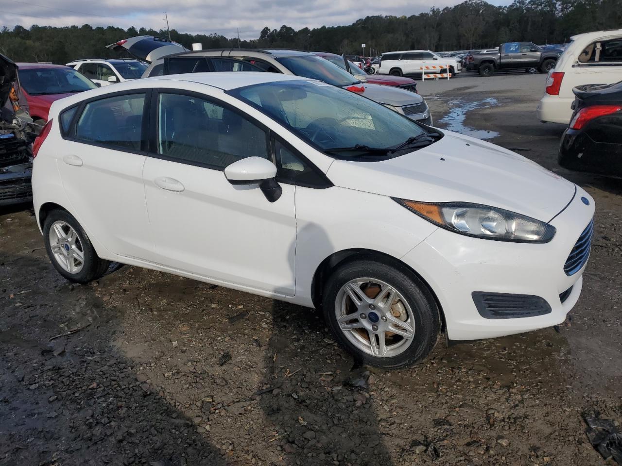2018 Ford Fiesta VIN 3FADP4EJ3JM122068 Copart auction photo, front end / side damage thumbnail 4