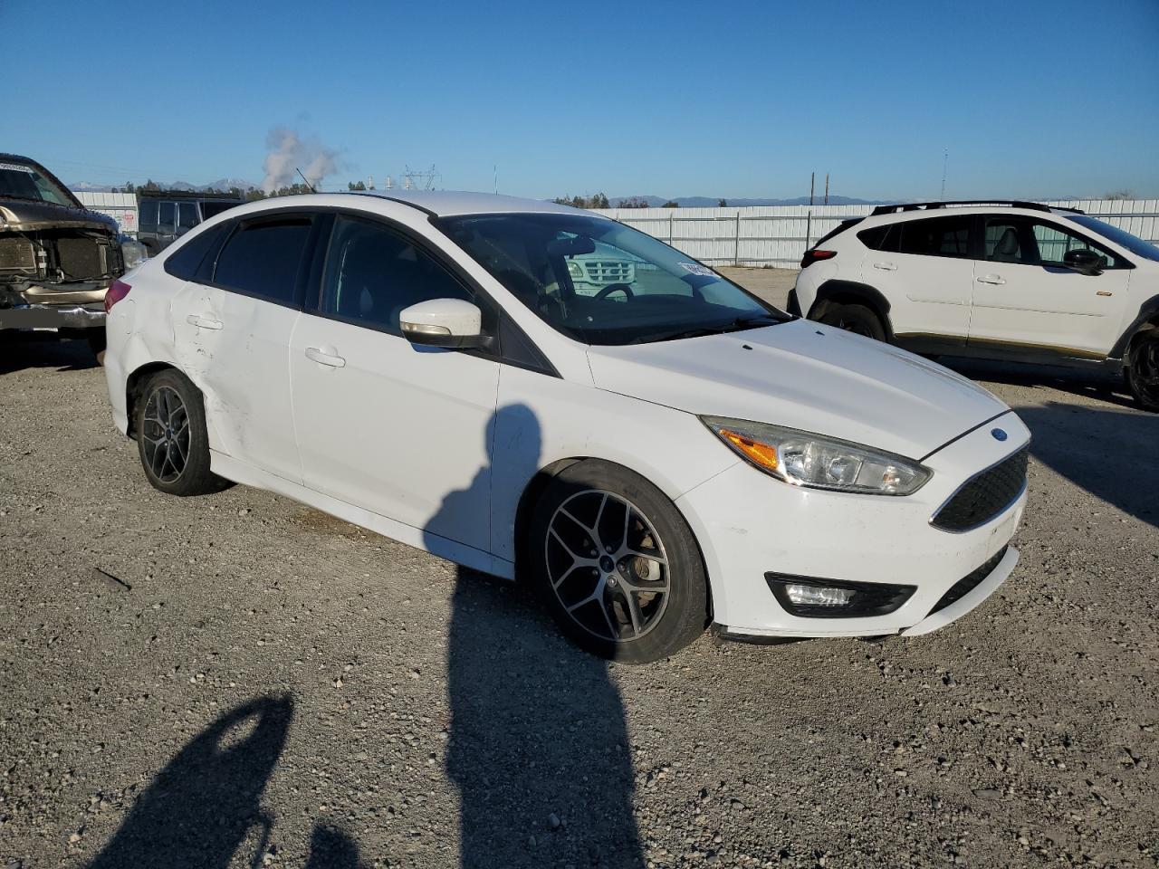 2016 Ford Focus VIN 1FADP3F29GL276196 Copart auction photo, side / rear end damage thumbnail 4