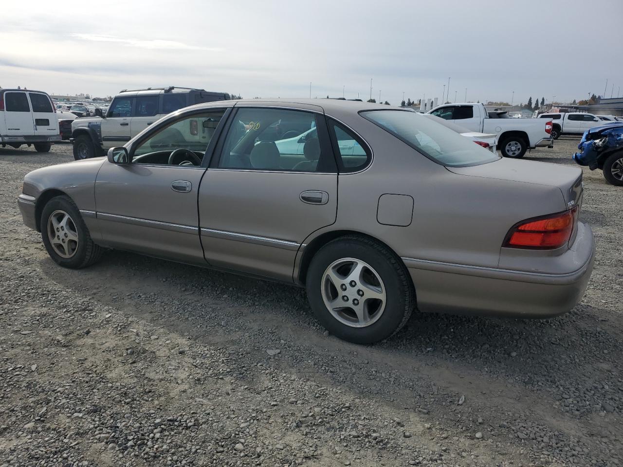 1999 Toyota Avalon VIN 4T1BF18B7XU332759 Copart auction photo, front end / side damage thumbnail 2