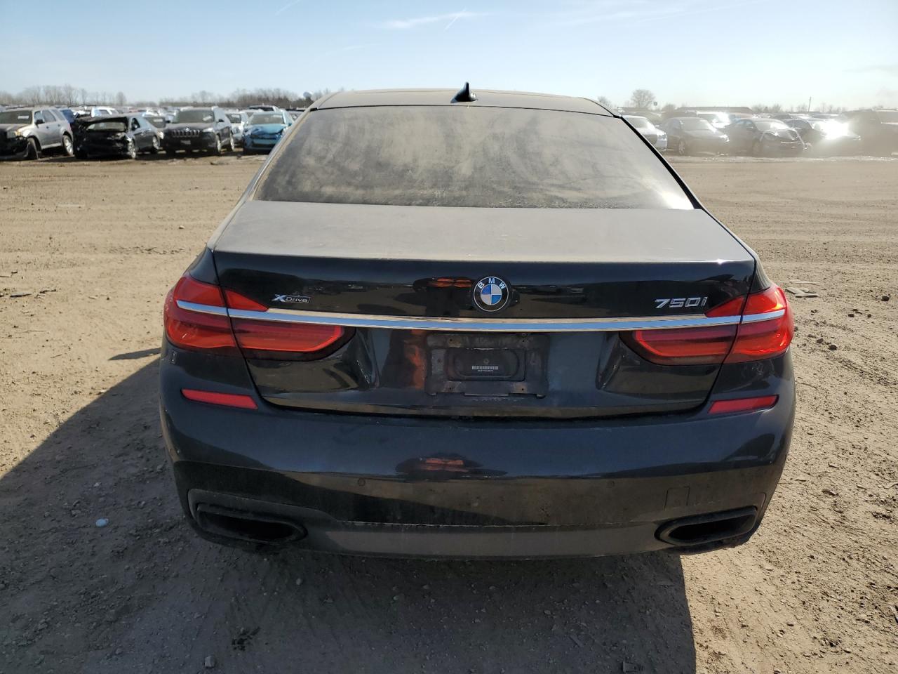 2016 BMW 7er VIN WBA7F2C58GG416375 Copart auction photo, front end / minor dent/scratches damage thumbnail 6