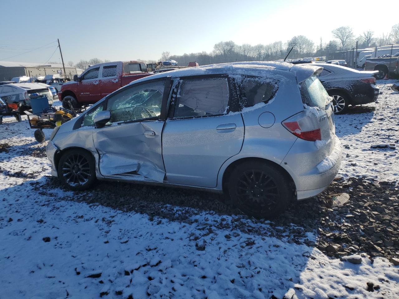 2012 Honda Fit VIN JHMGE8H57CC018379 Copart auction photo, side / front end damage thumbnail 2