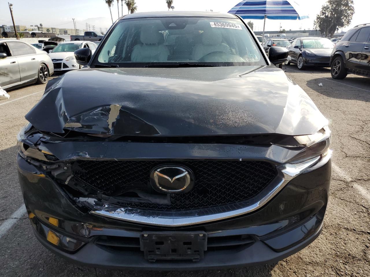 2018 Mazda CX-5 VIN JM3KFADM9J0337978 Copart auction photo, front end / minor dent/scratches damage thumbnail 5