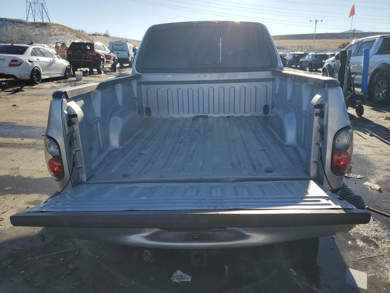 2001 Ford F-150 VIN 2FTZF07311CA70851 Copart auction photo, side damage thumbnail 6