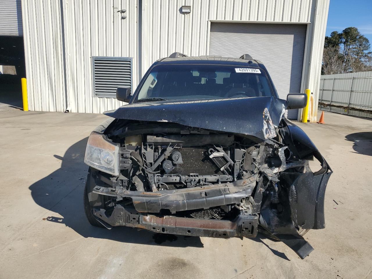 2015 Nissan Armada VIN 5N1BA0ND4FN603915 Copart auction photo, all over damage thumbnail 5