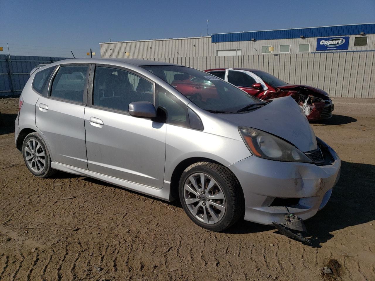 2012 Honda Fit VIN JHMGE8H5XCC020546 Copart auction photo, front end / hail damage thumbnail 4