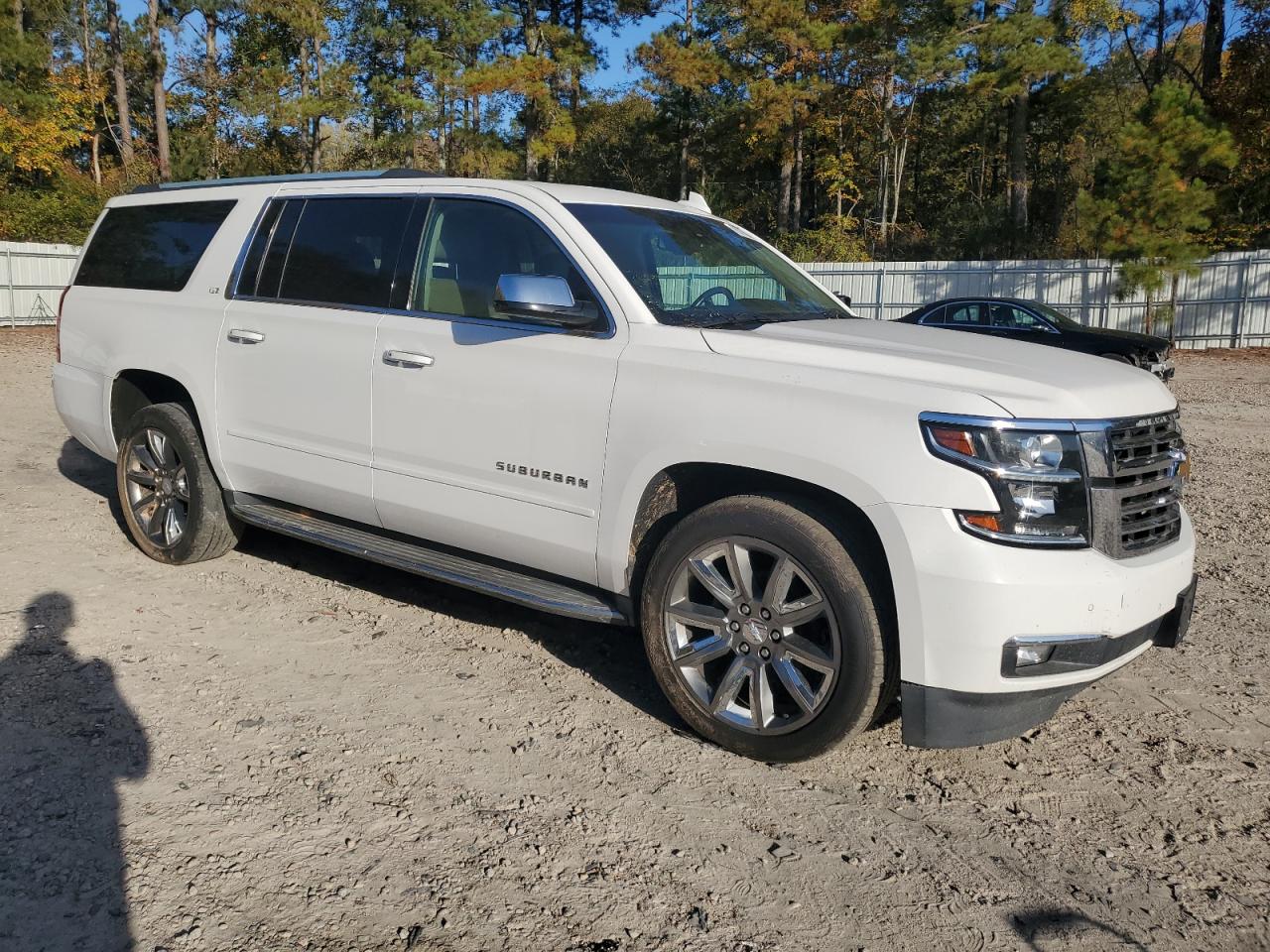 2015 Chevrolet Suburban VIN 1GNSKKKC1FR709845 Copart auction photo, side damage thumbnail 4