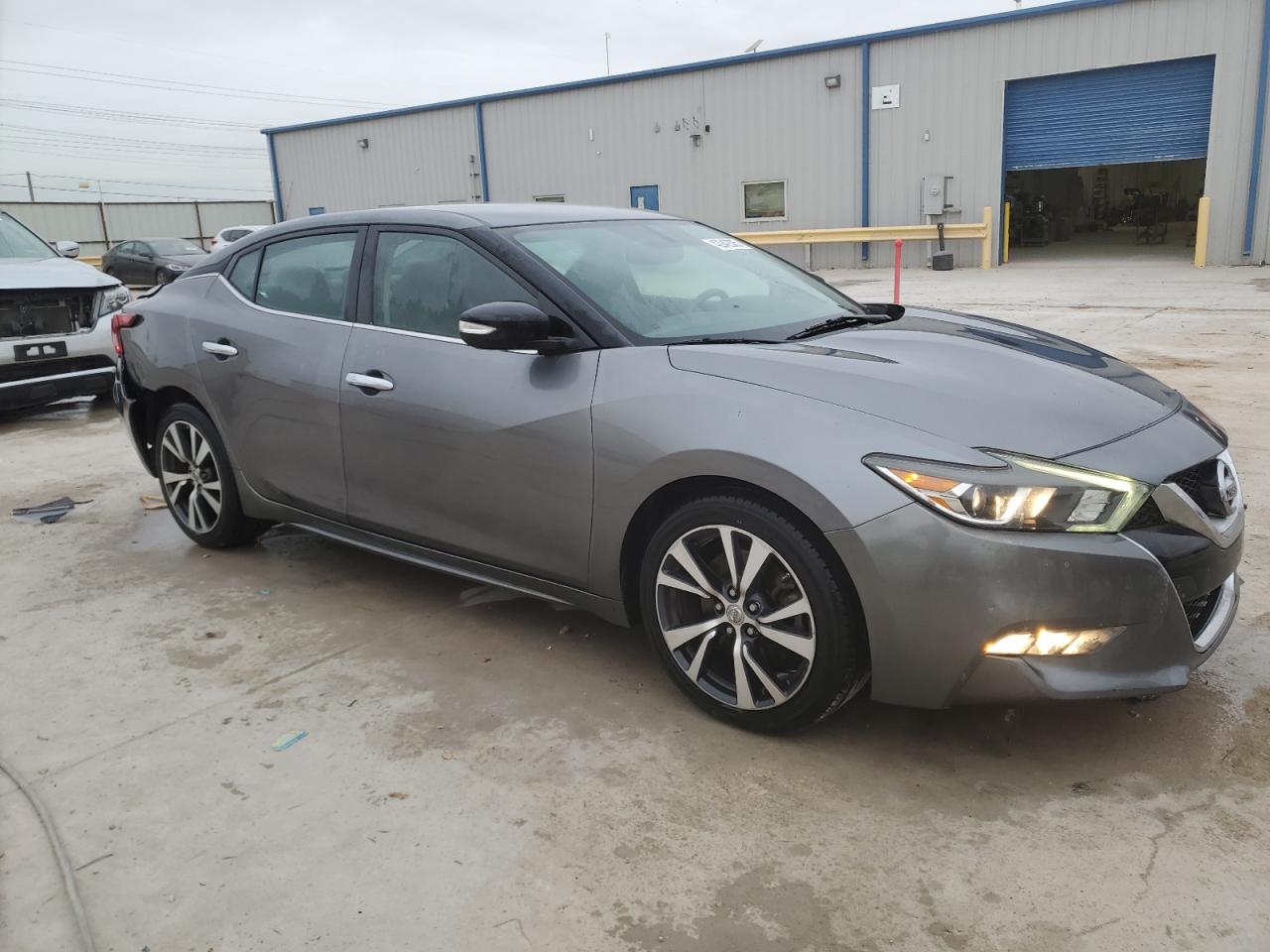 2017 Nissan Maxima VIN 1N4AA6AP4HC401292 Copart auction photo, rear end / minor dent/scratches damage thumbnail 4